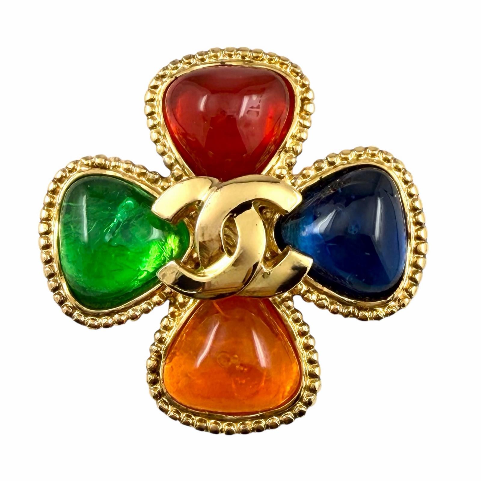 CHANEL multicolor glass CC brooch on white background